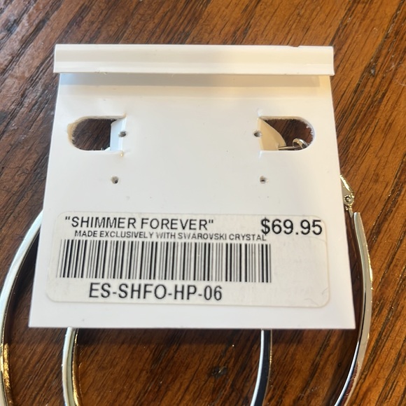 Large rhodium hoops with striking black Swarovski crystals. - Picture 7 of 7